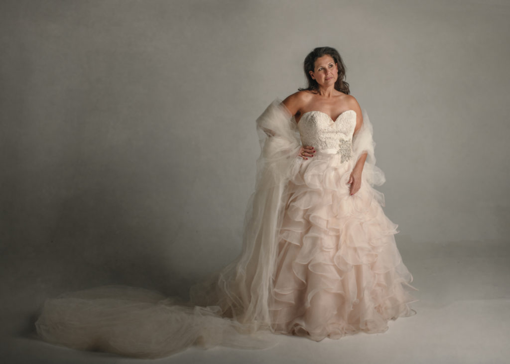 a woman wearing a gown captured by studio portrait Bella Luna Photography in Loudoun County